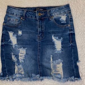 Ripped denim blue skirt